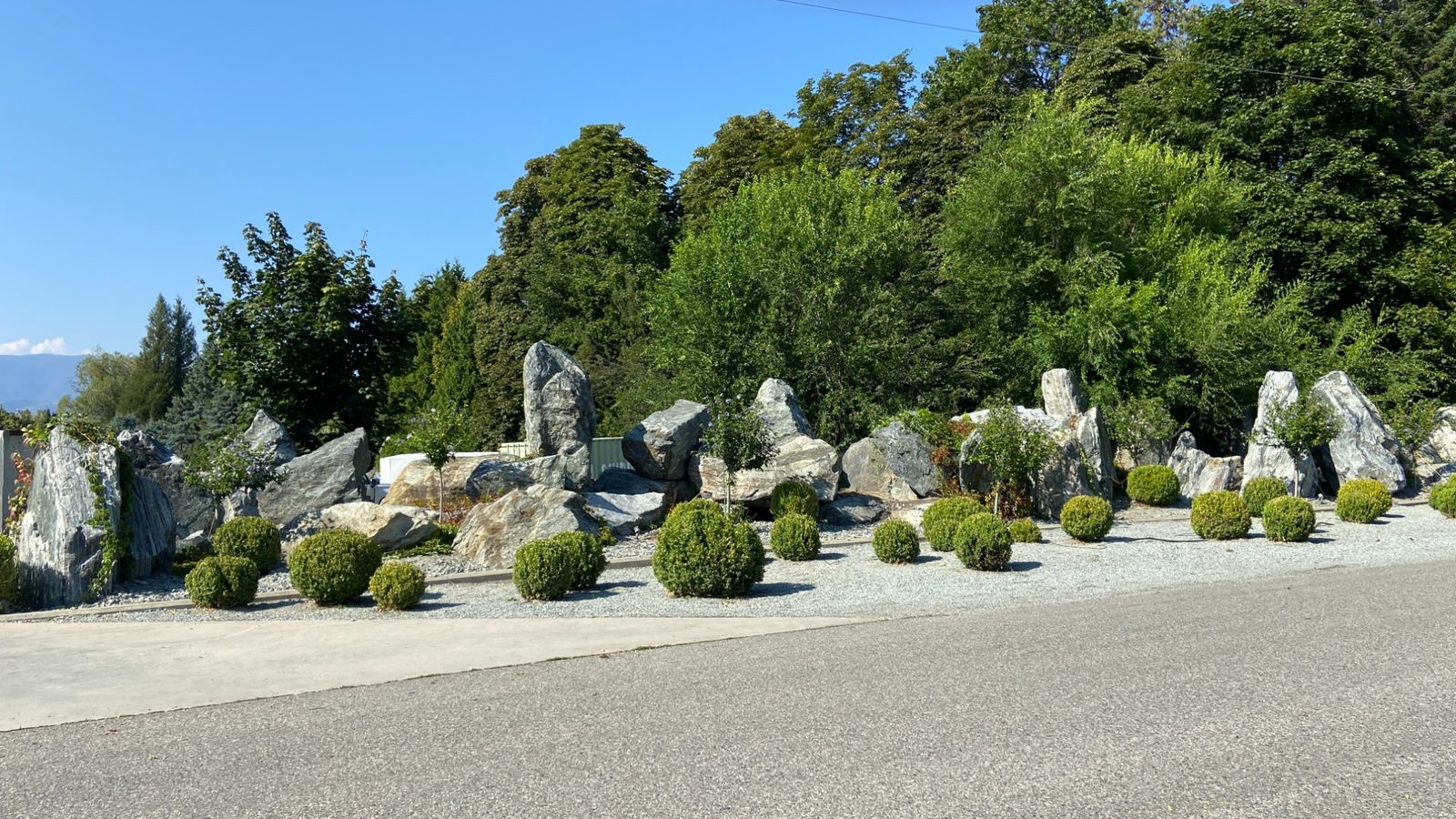 Boxwood shaping and rock garden maintenance Kelowna
